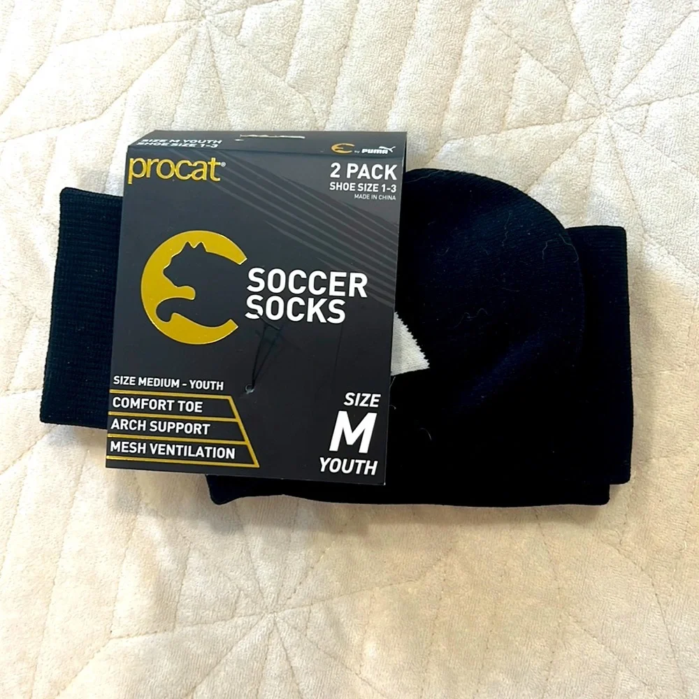Puma soccer socks, procat size medium youth, shoe size one to three